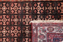 Close-up detail of 1990s Hamedan rug from Iran / Persia showing Wool weave