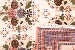 Close-up detail of 2002s Hamedan rug from Iran / Persia showing Wool weave