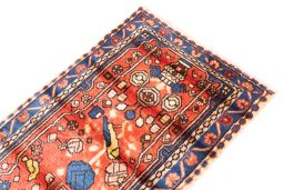 Surface texture of 1975s Hamedan rug with natural Wool and intricate pattern