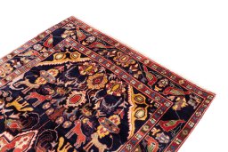 Surface texture of 2000s Hamedan rug with natural Wool and intricate pattern