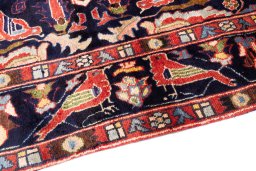 Backside of handmade 2000s Hamedan rug showing knot structure and weave density