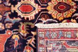 Close-up detail of 2000s Hamedan rug from Iran / Persia showing Wool weave