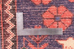Corner detail of 1971s Hamedan rug showing border pattern and Wool pile