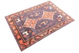 Corner detail of 1971s Hamedan rug showing border pattern and Wool pile