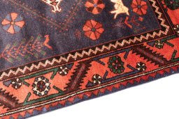 Backside of handmade 1971s Hamedan rug showing knot structure and weave density