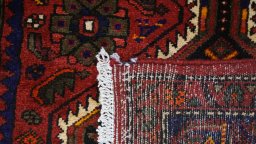 Close-up detail of New Hamedan rug from Iran / Persia showing Wool weave