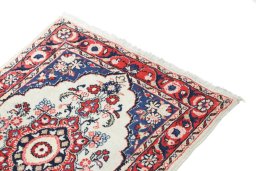 Surface texture of 1990s Hamedan rug with natural Wool and intricate pattern