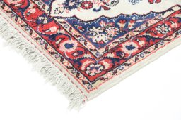 Backside of handmade 1990s Hamedan rug showing knot structure and weave density