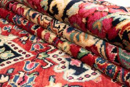 Close-up detail of 2002s Hamedan rug from Iran / Persia showing Wool weave
