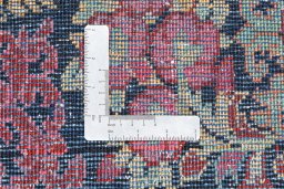 Backside of handmade 2002s Hamedan rug showing knot structure and weave density
