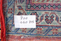 Central medallion detail of 2002s Hamedan rug from Iran / Persia