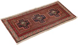 Close-up detail of 1900s Heriz rug from Iran / Persia showing Wool weave