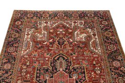 Backside of handmade 1930s Heriz rug showing knot structure and weave density