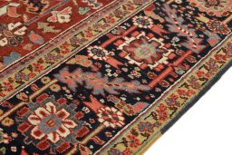 Close-up detail of 1930s Heriz rug from Iran / Persia showing Wool weave