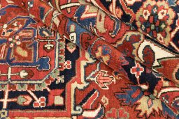Close-up detail of 1940s Heriz rug from Iran / Persia showing Wool weave