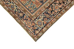 Backside of handmade 1920s Heriz rug showing knot structure and weave density