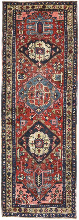 Full view of 1920s Heriz rug from Iran / Persia, 320 × 110 cm in Red tones