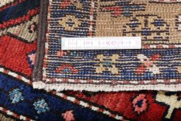 Corner detail of 1920s Heriz rug showing border pattern and Wool pile