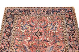 Surface texture of 1920s Heriz rug with natural Wool and intricate pattern