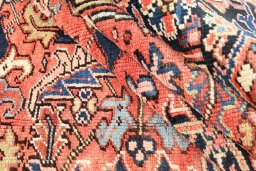 Full view of 1920s Heriz rug from Iran / Persia, 277 × 210 cm in Red tones