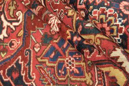 Corner detail of 1940s Heriz rug showing border pattern and Wool pile