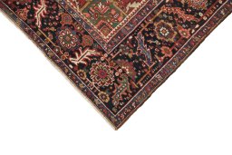 Backside of handmade 1940s Heriz rug showing knot structure and weave density