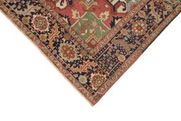 Backside of handmade 1900s Heriz rug showing knot structure and weave density