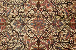 Close-up detail of 1920s Heriz rug from Iran / Persia showing Wool weave