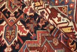 Corner detail of 1940s Heriz rug showing border pattern and Wool pile