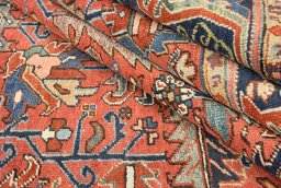 Full view of 1920s Heriz rug from Iran / Persia, 325 × 238 cm in Red tones