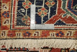 Corner detail of 1920s Heriz rug showing border pattern and Wool pile