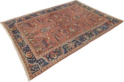Surface texture of 1920s Heriz rug with natural Wool and intricate pattern