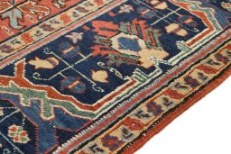 Close-up detail of 1920s Heriz rug from Iran / Persia showing Wool weave