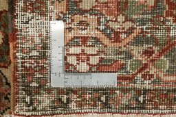 Full view of 1930s Heriz rug from Iran / Persia, 370 × 265 cm in Red tones