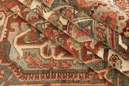 Corner detail of 1930s Heriz rug showing border pattern and Wool pile