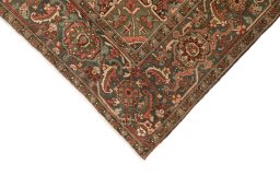 Backside of handmade 1930s Heriz rug showing knot structure and weave density