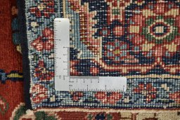 Full view of 1920s Heriz rug from Iran / Persia, 264 × 174 cm in Red tones
