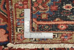 Full view of 1930s Heriz rug from Iran / Persia, 368 × 284 cm in Red tones