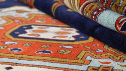 Corner detail of 1990s Heriz rug showing border pattern and Wool pile
