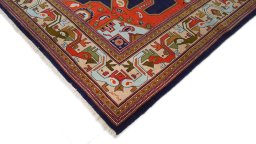 Backside of handmade 1990s Heriz rug showing knot structure and weave density
