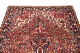 Surface texture of 1940s Heriz rug with natural Wool and intricate pattern