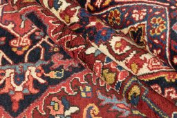 Corner detail of 1940s Heriz rug showing border pattern and Wool pile