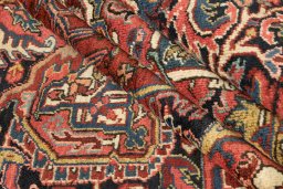 Corner detail of 1940s Heriz rug showing border pattern and Wool pile