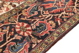 Close-up detail of 1940s Heriz rug from Iran / Persia showing Wool weave