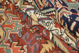 Corner detail of 1920s Heriz rug showing border pattern and Wool pile