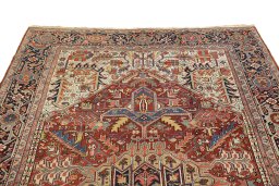 Surface texture of 1920s Heriz rug with natural Wool and intricate pattern