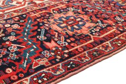 Close-up detail of 1940s Heriz rug from Iran / Persia showing Wool weave