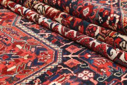 Close-up detail of 1940s Heriz rug from Iran / Persia showing Wool weave