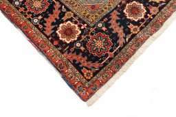 Backside of handmade 1990s Heriz rug showing knot structure and weave density