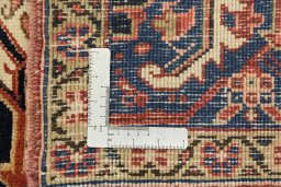 Corner detail of 1940s Heriz rug showing border pattern and Wool pile